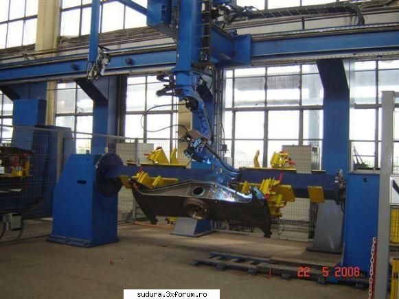 varianta de celula pentru sudare ,,grea,, - industria cf roboti motoman
